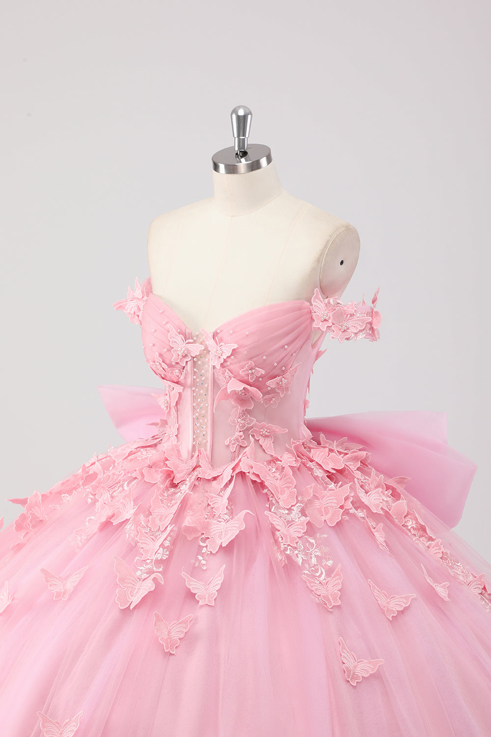 Prinsessa rodna rosa balklänning från axeln pärlstav fjäril tyll quinceanera klänning med rosett