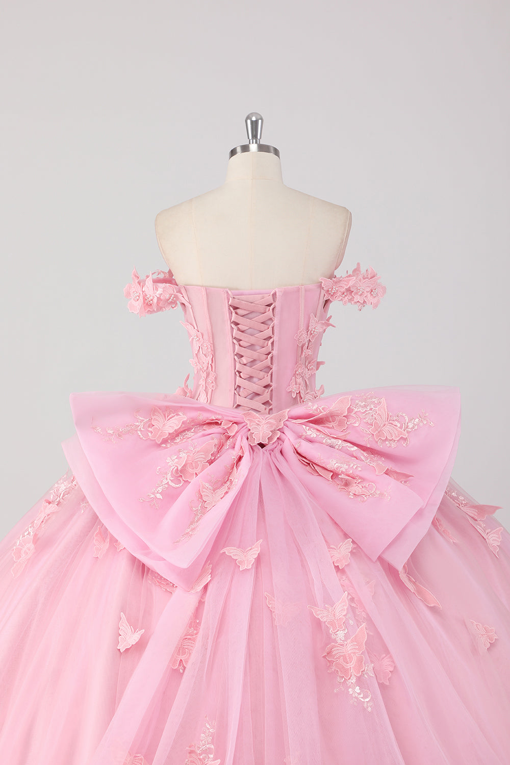 Prinsessa rodna rosa balklänning från axeln pärlstav fjäril tyll quinceanera klänning med rosett