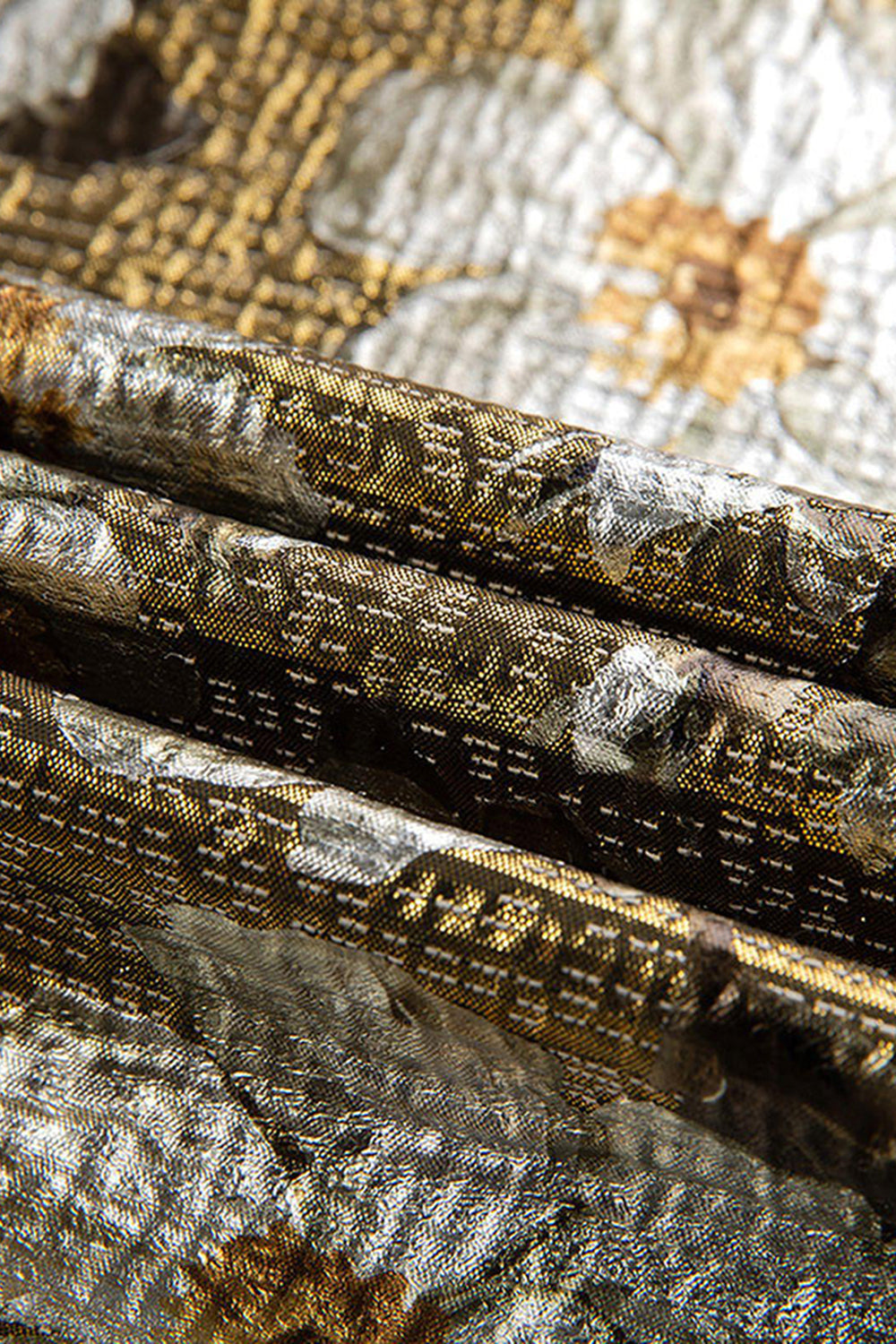 Guldtryckt blommig en knapp balkavaj