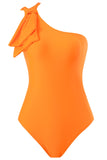 Ett stycke orange rynkade strandbadkläder