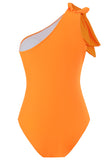 Ett stycke orange rynkade strandbadkläder