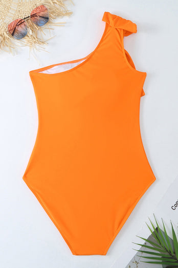 Ett stycke orange rynkade strandbadkläder