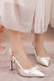 Eleganta elfenbensspetsiga stilettklackar Högklackade bröllopskor med rosett