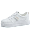 Vita platta avslappnade sneakers