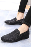 Svarta paljetterade slip-on herrskor