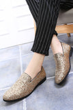 Svarta paljetterade slip-on herrskor