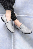 Svarta paljetterade slip-on herrskor