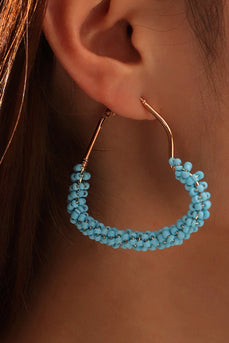 Blå asymmetriska örhängen