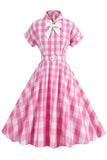 Rosa rutig bowknot 1950-talsklänning med korta ärmar