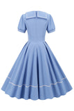 Retro stil blå 1950 -talsklänning med korta ärmar