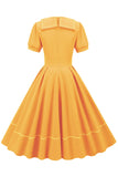Retro stil blå 1950 -talsklänning med korta ärmar