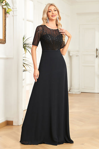 Glittrande svart formell klänning med korta ärmar