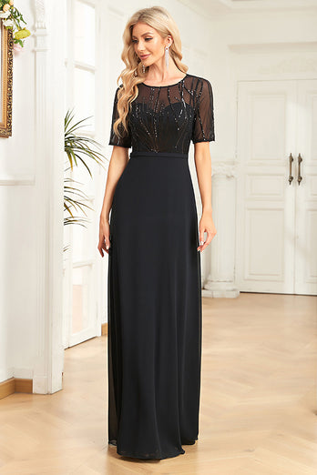 Glittrande svart formell klänning med korta ärmar